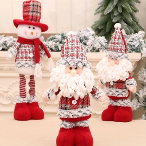Charming trio of telescopic Christmas dolls featuring Santa and snowman in festive plaid attire