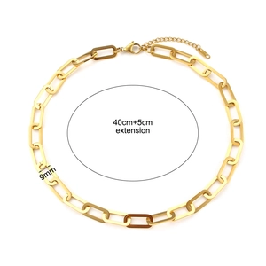 Detail of 18K gold clip chain necklace with tortoise resin link and 5cm extension