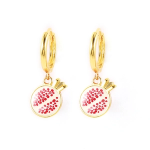 Detail of S925 silver pomegranate earrings with red enamel charms and golden hoops
