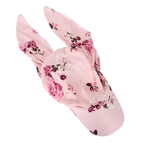 Detailed close-up of the pink floral fabric and rabbit ear knot on this turban hat