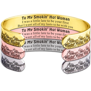 Detailed view of three stackable stainless steel cuffs with To My Smokin Hot Woman engraving