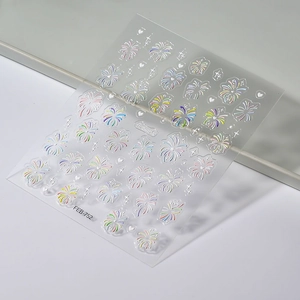 Close-up of 5D colorful fireworks and heart patterns on embossed nail art sticker sheet