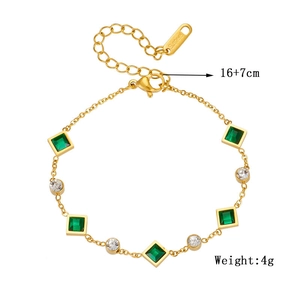Minimalist stainless steel bracelet with green emerald cut stones and white zircon details