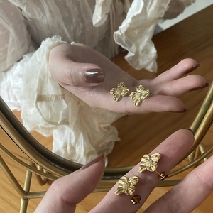 Vintage irregular liquid metal flower stud earrings in 18K gold plated titanium steel