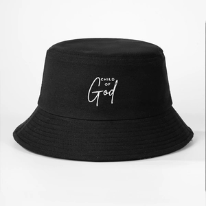 Close-up of CHILD OF God embroidery on a black cotton canvas bucket hat