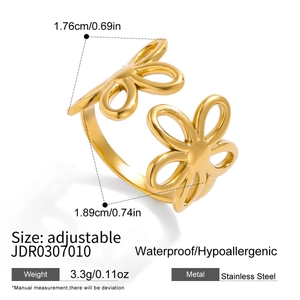 Detail view of gold flower open ring in stainless steel with size and weight dimensions