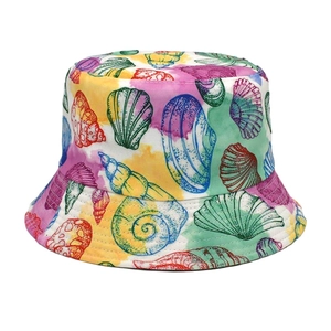 Detailed pattern view of reversible sun hat with colorful sea shell and starfish prints
