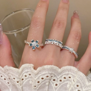 Three-piece silver ring set with blue floral enamel and lace crown details for women