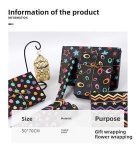 Detail view of 50x70cm black striped and geometric gift wrapping paper on gift boxes