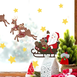 Christmas wall stickers with Santa and reindeer on a window for holiday home decoration