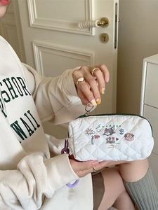 Quilted floral pencil case with cute cat embroidery and green zipper for students