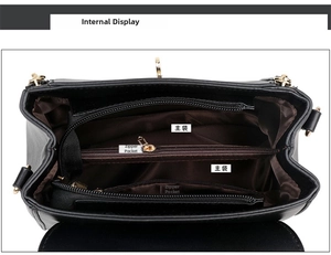 Detail view of black PU leather shoulder bag featuring multi-layer inner compartments
