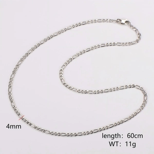 Detail view of 4mm wide silver Figaro chain necklace with 60cm length and 11g weight