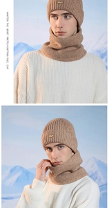 Close-up of camel winter knit hat and neck warmer set with soft fleece texture