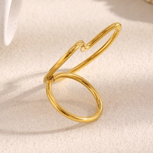 Detail shot of the minimalist 18K gold plated double-band open ring on a warm background