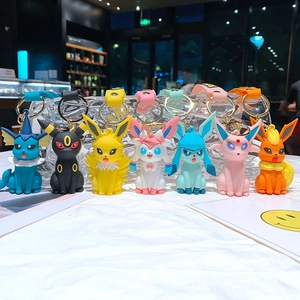Collection of 7 Pokemon Eevee evolution keychains in vibrant colors for bag decor