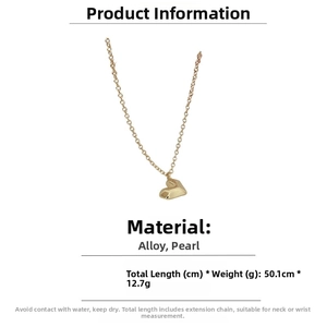 Detail of 2-piece gold heart pendant necklace showing 50.1cm length and alloy material
