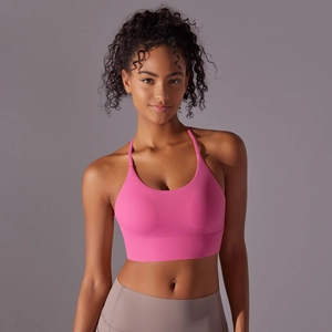 Pink double-sided nylon sports bra with cross back and thin straps for yoga fitness