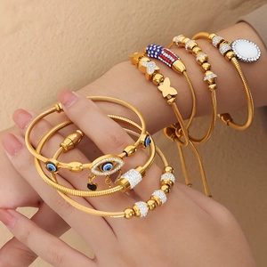 Bohemian gold stainless steel charm bracelets with evil eye and butterfly pendants