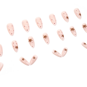 Polka dot and star pattern long almond press-on nails in translucent nude skin tones