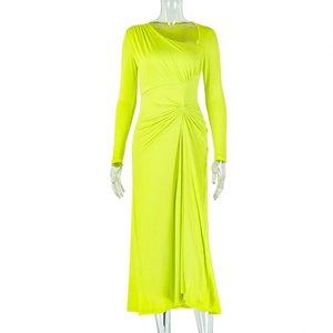 Detail of elegant slim fit long dress with ruched waist and asymmetric neckline in lime green