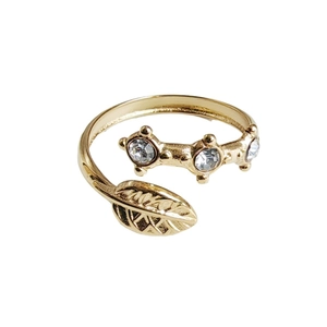 Gold leaf ring with sparkling crystals and adjustable open band in 18K plated finish