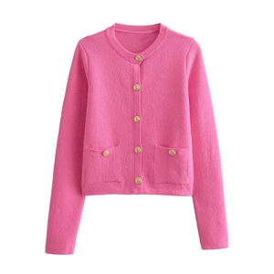 Detail of rose pink cardigan with gold embossed buttons and two front patch pockets
