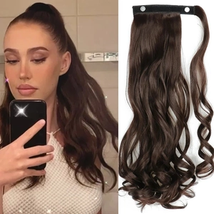 Detail view of wavy long ponytail extension with velcro strap and inner clip in dark brown