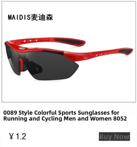 Detail of red streamlined sports sunglasses with dark lenses for outdoor cycling
