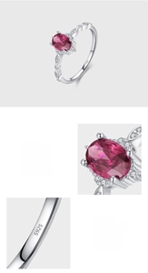 Macro shot of S925 sterling silver stamp and oval pink zircon in prong setting