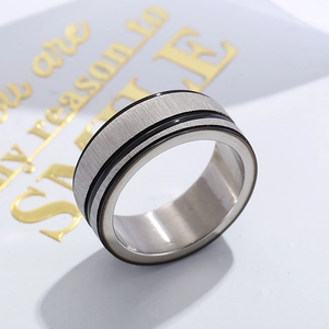 Brushed stainless steel ring with double black enamel lines in a minimalist style