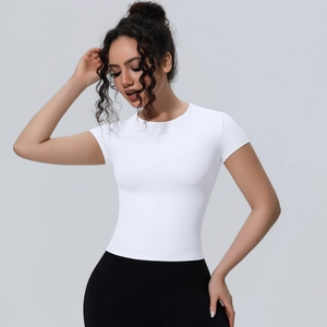 Detail of white slim-fit yoga t-shirt showing breathable fabric and elastic crew neck