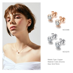 Detailed view of 6mm cubic zirconia stud earrings and necklace with size specifications