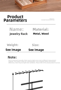 Detail view of multi-layer jewelry stand with wooden tray and black metal earring rack