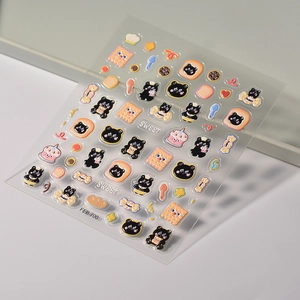 Detail of 3D embossed nail stickers featuring cartoon bears, cookies and sweet desserts