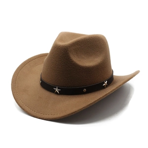 Detail of a brown felt cowboy hat featuring black leather band with silver star studs