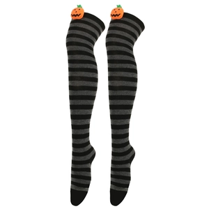 Detail of Halloween over-the-knee socks with black-grey stripes and orange pumpkin faces