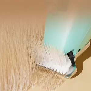 Tondeuse électrique vert menthe pour animaux avec lame céramique coupant les poils