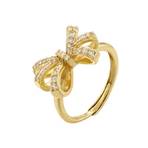 Detailed view of a gold bow ring featuring sparkling micro-pave cubic zirconia stones