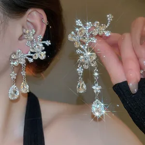 Silver flower earrings with crystal clusters and elegant water drop tassel fringe