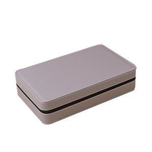 Grey-purple leather watch storage case with black zipper closure and rectangular design