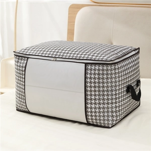 Detailed view of houndstooth storage bag with clear window and reinforced handles