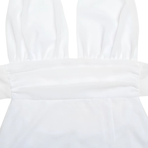 Detail of deep V-neckline and ruched waist on a white backless chiffon dress