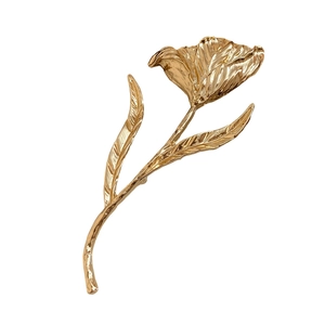 Elegant gold tulip brooch with polished petal textures and a minimalist floral design