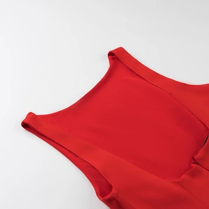 Close-up of the ruffled halter neckline and back invisible zipper on this red sexy mini dress