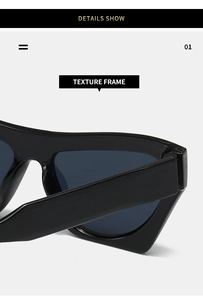 Detailed side view of thick textured black cat-eye sunglasses with polished frame