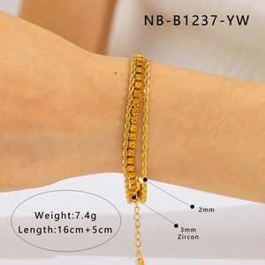 Detailed view of layered gold-plated bracelet with zircon stones and rope chain dimensions