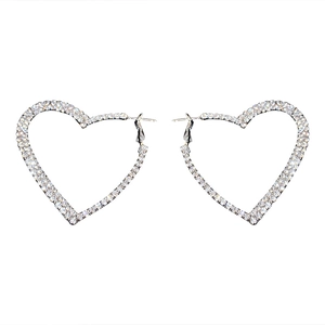 Exaggerated silver heart hoop earrings with sparkling rhinestones in a minimalist style