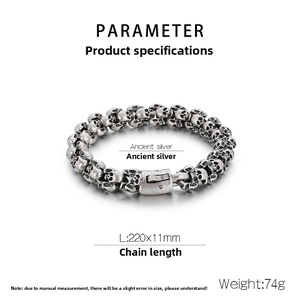 Close-up of ancient silver gothic skull link chain bracelet in stainless steel