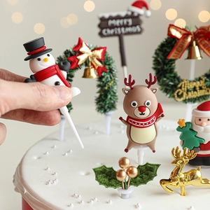 Christmas cake decoration set with Santa, reindeer and tree for holiday party baking